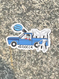Greek sticker, blue truck, plastic patio chairs