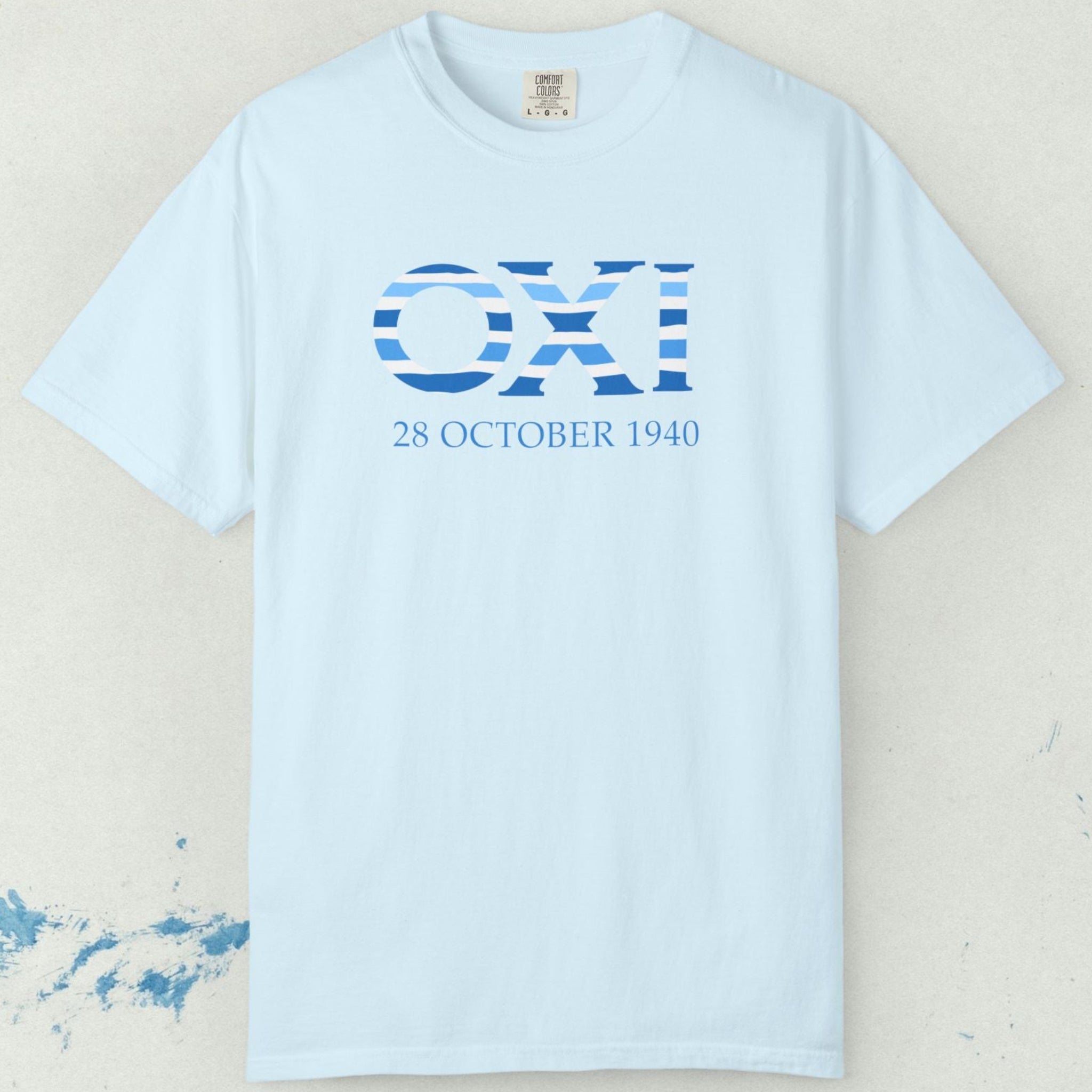Light blue t-shirt with 'OXI 28 OCTOBER 1940' text on a light gray background
