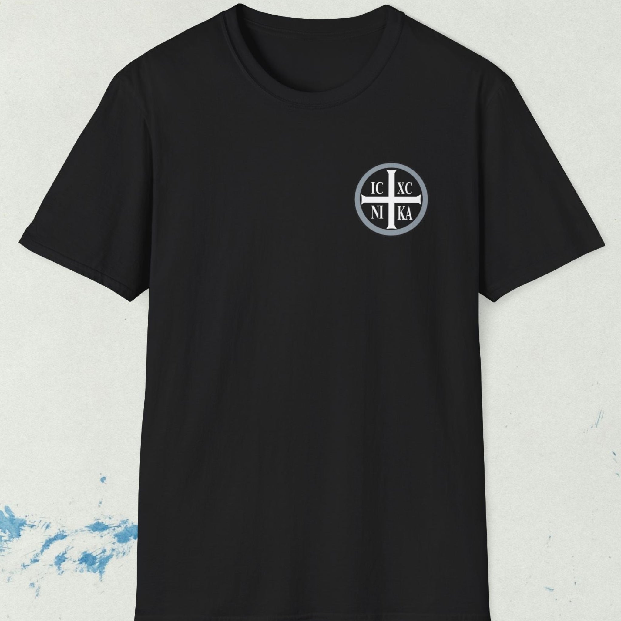 Black t-shirt with a logo on a textured white background